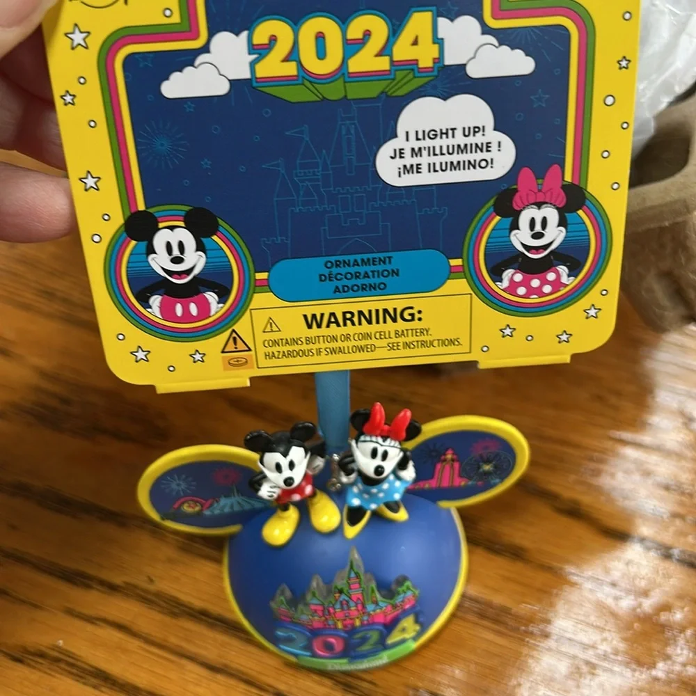 Disney 2024 lighted Christmas ornament.  Excellent condition.  New in box.